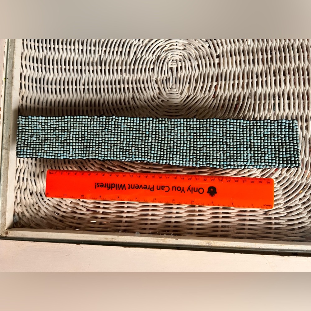 About 15 inches long turquoise colored beaded belt